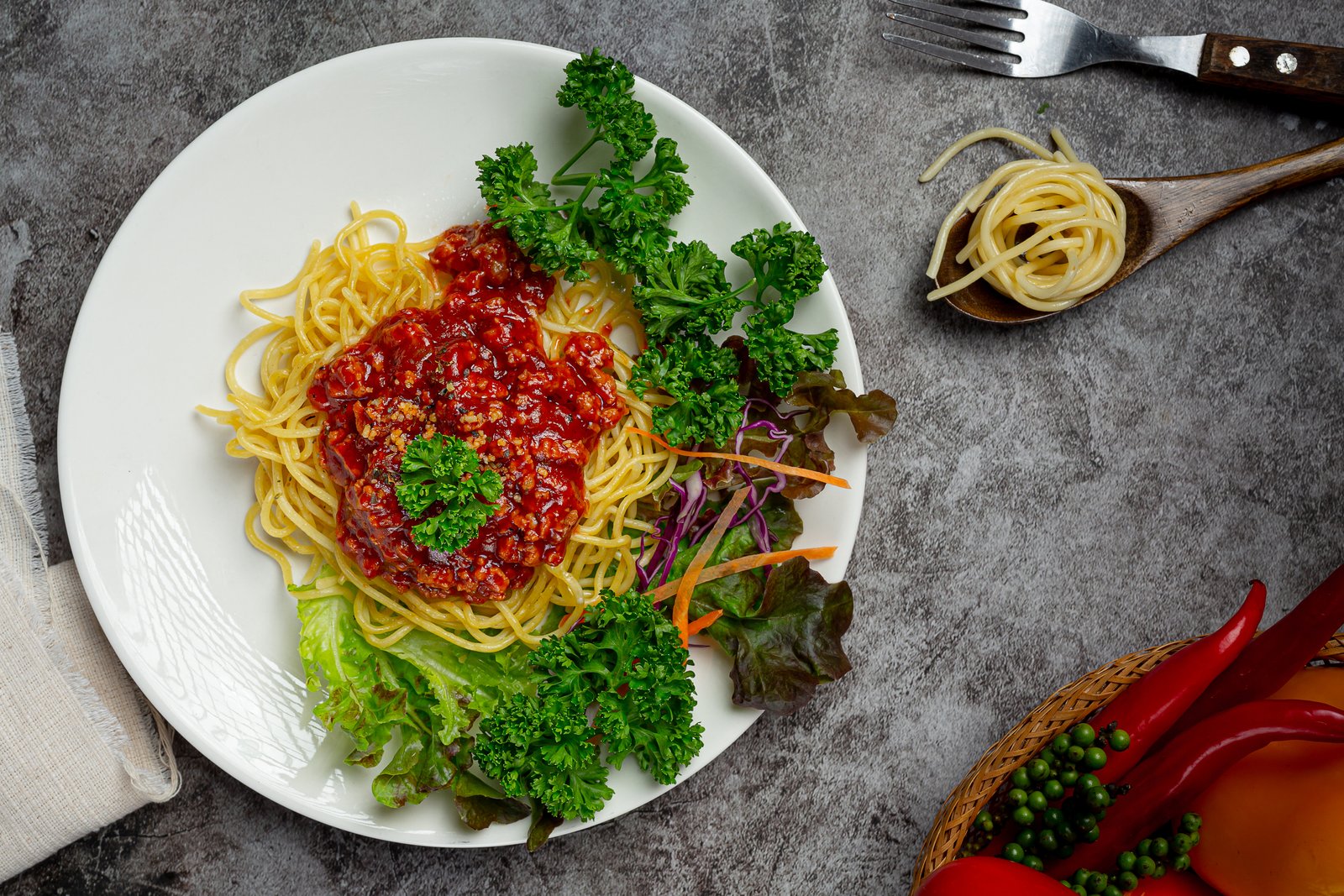 delicious spaghetti served with beautiful ingredients.